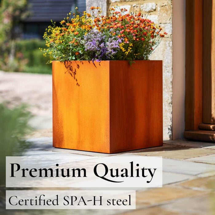 Corten metal planter with flowers on a patio, labeled 'Premium Quality Certified SPA-H steel'.