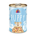 Weruva Chicken & Rice Formula in Gravy for puppies features a blue, heart-themed can with puppy graphics and labels showing it's gluten and carrageenan free, made with omega-3 nutrition.